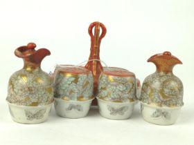 Three pieces Japanese Kutani ceramics, including cruet set, trinket pot and small footed dish