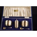 Silver three piece textured silver cruet set, Deakin & Francis Ltd, Birmingham 1974-76, with salt an