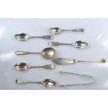 Eight pieces of hallmarked silver, including: set of four teaspoons by Josiah Williams & Co London 1