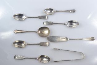 Eight pieces of hallmarked silver, including: set of four teaspoons by Josiah Williams & Co London 1