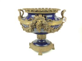 Large Sevres style ornate brass and cobalt blue urn W45cm x H40cm