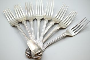 Eight Victorian silver fiddle and thread pattern dessert forks, with armorial to underside of termin