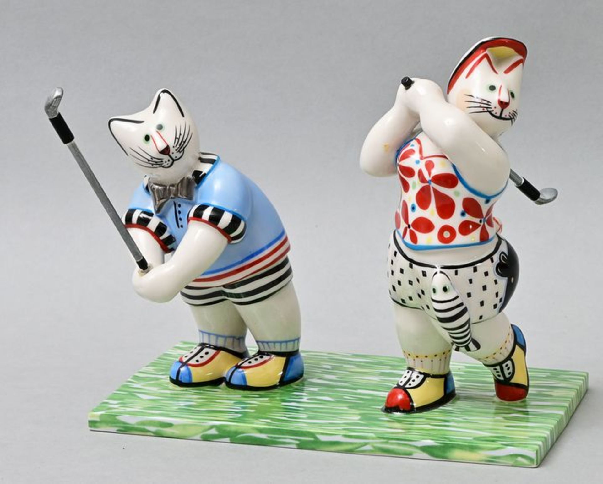 Kater Benedikt als Golfer/ golf playing cats