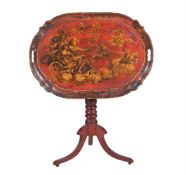 A RED JAPANNED AND GILT DECORATED TRAY TOPPED TABLE