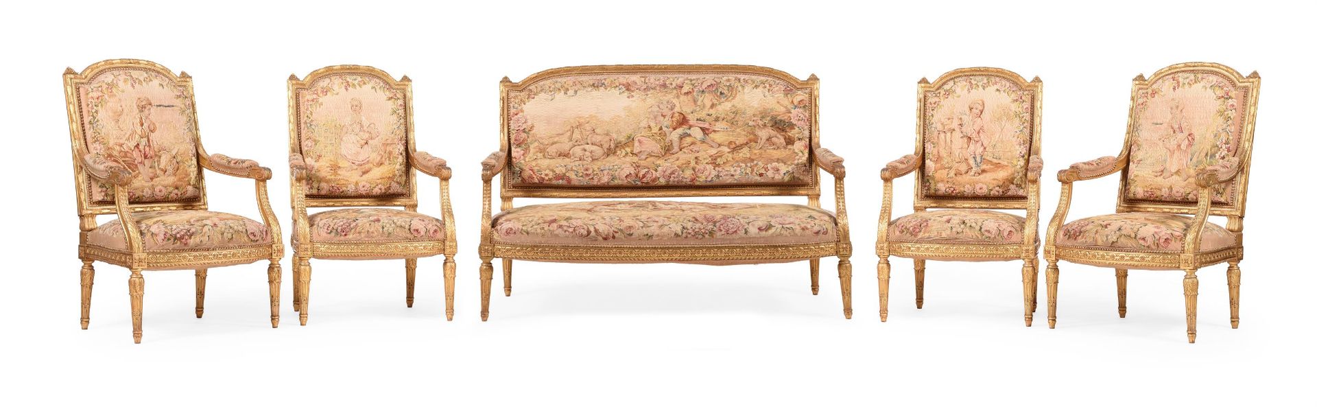 A FRENCH TRANSITIONAL AUBUSSON UPHOLSTERED GILTWOOD SALON SUITE, IN LOUIS XVI STYLE