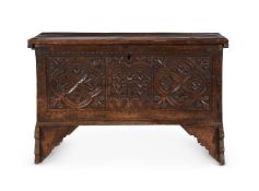 A CONTINENTAL CARVED FRUITWOOD COFFER