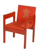 A RED PAINTED ARMCHAIR FROM THE INVESTITURE OF THE PRINCE OF WALES