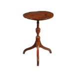A SOLID ELM TRIPOD OCCASIONAL TABLE
