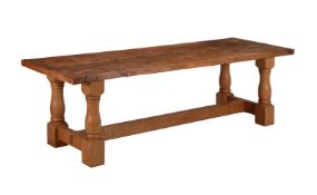AN OAK AND ELM REFECTORY TABLE IN 18TH CENTURY STYLE