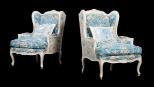 A PAIR OF FRENCH PAINTED WOOD AND UPHOLSTERED ARMCHAIRS IN LOUIS XVI STYLE