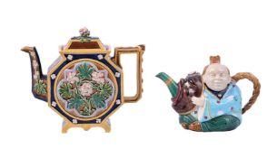 A MINTON MAJOLICA TEAPOT AND COVER MODELLED AS A CHINESE-FIGURE