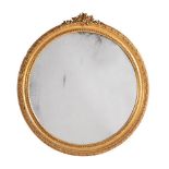 A VICTORIAN GILTWOOD AND COMPOSITION WALL MIRROR