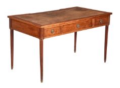 A FRENCH WALNUT WRITING TABLE
