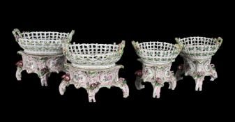 TWO PAIRS OF SIMILAR HEREND PIERCED BASKETS AND STANDS