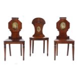 A PAIR OF REGENCY MAHOGANY HALL CHAIRS