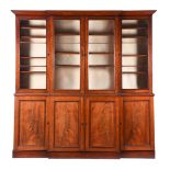 AN EARLY VICTORIAN MAHOGANY BREAKFRONT BOOKCASE