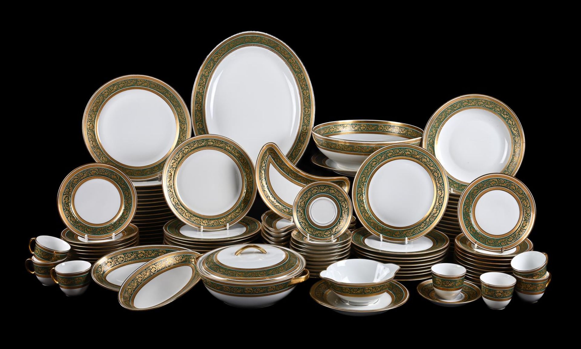 A MODERN LIMOGES (L. BERNARDAUD & Co.) GREEN BORDERED AND GILT 'CHAMBORD' PATTERN PART DINNER SERVIC