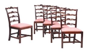 A SET OF FIVE GEORGE III MAHOGANY ‘LADDER BACK’ DINING CHAIRS