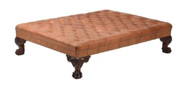 A MAHOGANY AND LEATHER UPHOLSTERED CENTRE STOOL IN GEORGE II IRISH STYLE