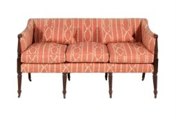 A MAHOGANY AND UPHOLSTED SOFA IN LATE GEORGE III STYLE