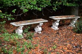 A PAIR OF COMPOSITE STONE BENCHES