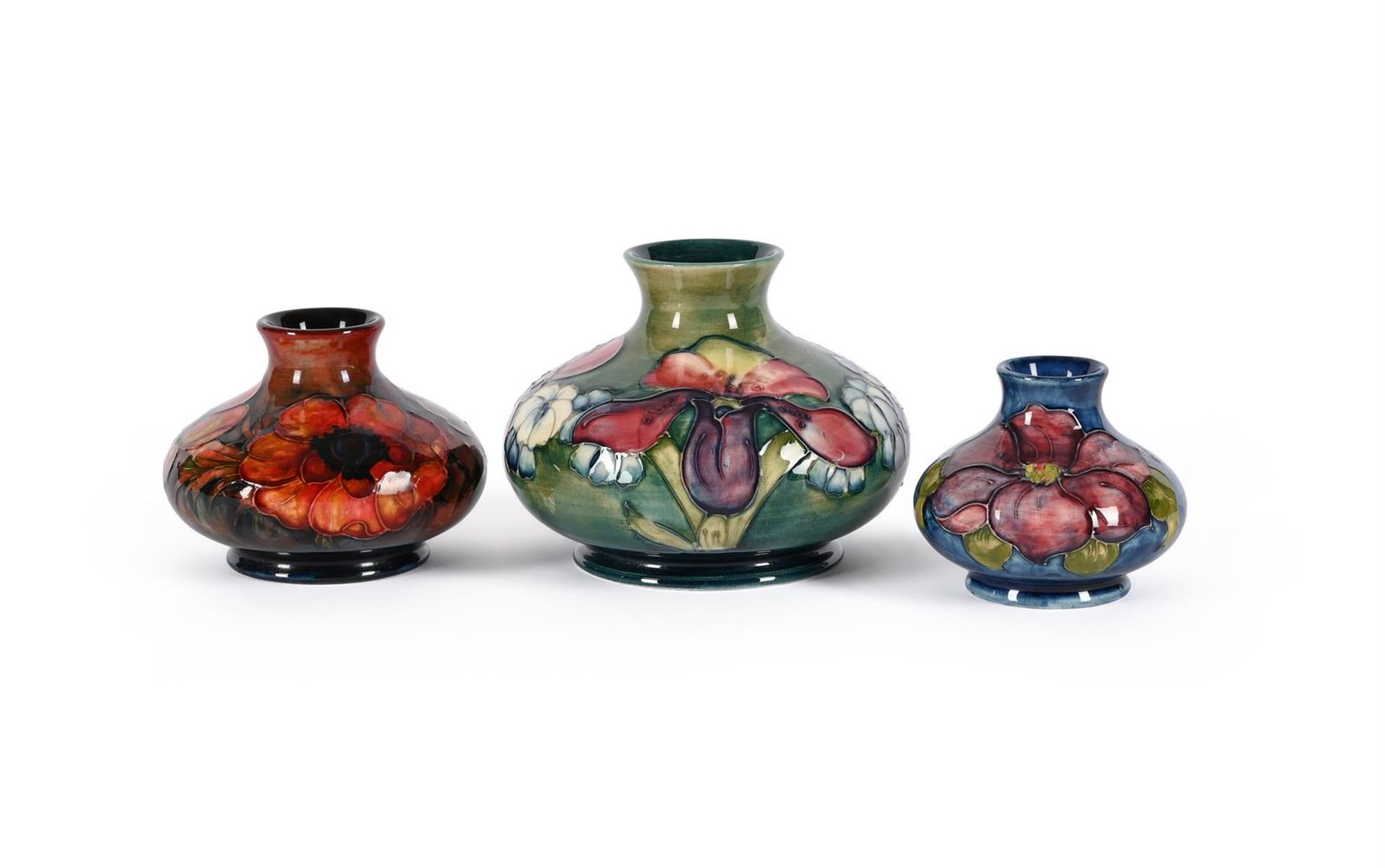 A GROUP OF THREE MOORCROFT SQUAT VASES