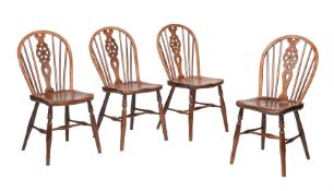 A SET OF FOUR ASH AND ELM WINDSOR CHAIRS