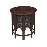 A CARVED HARDWOOD TABLE IN MOORISH TASTE