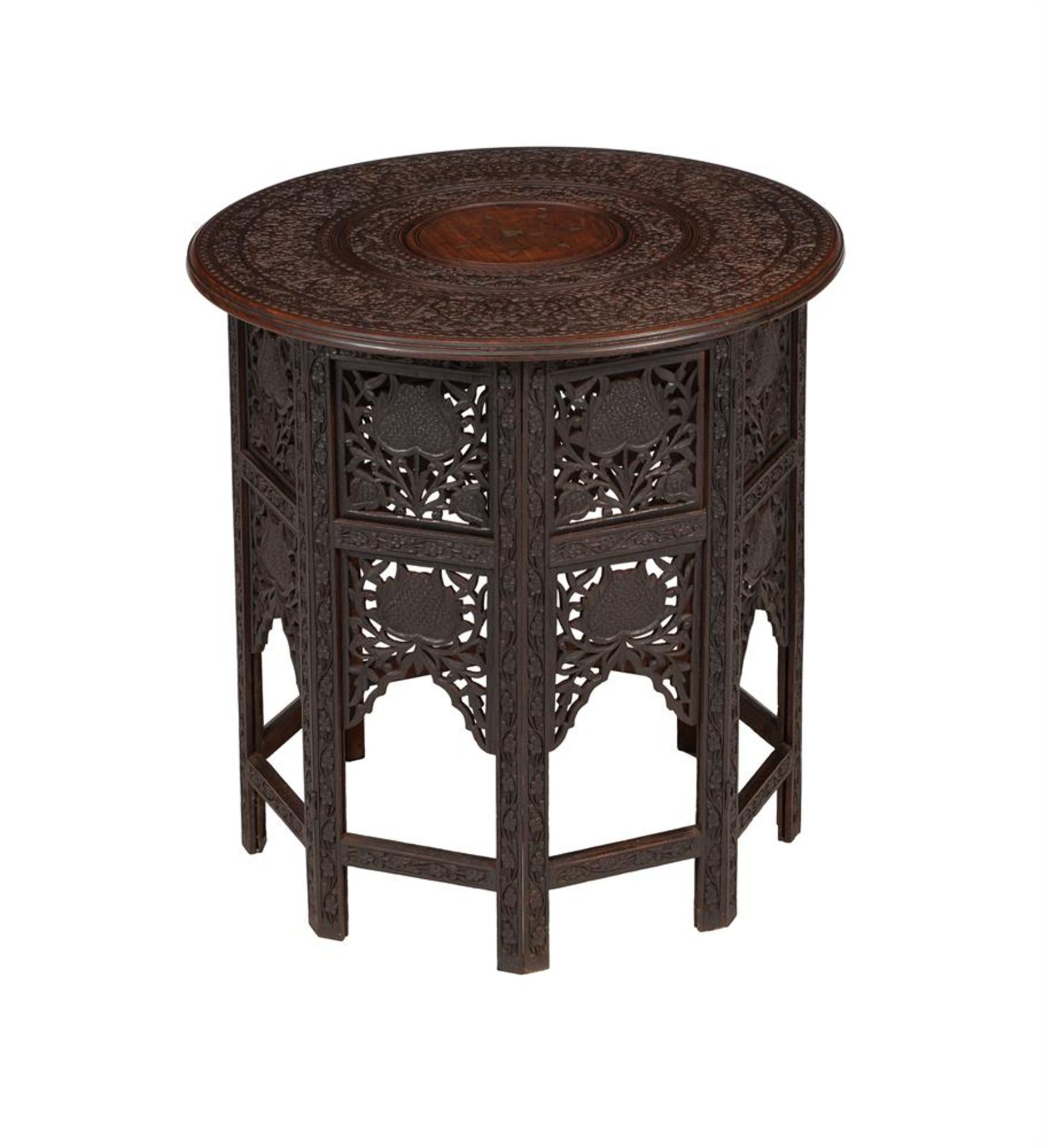 A CARVED HARDWOOD TABLE IN MOORISH TASTE