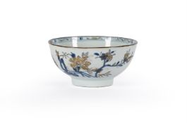 A CHINESE NANKING CARGO UNDERGLAZE BLUE AND GILT BOWL