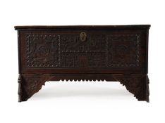 A CARVED HARDWOOD COFFER, PROBABLY OTTOMAN