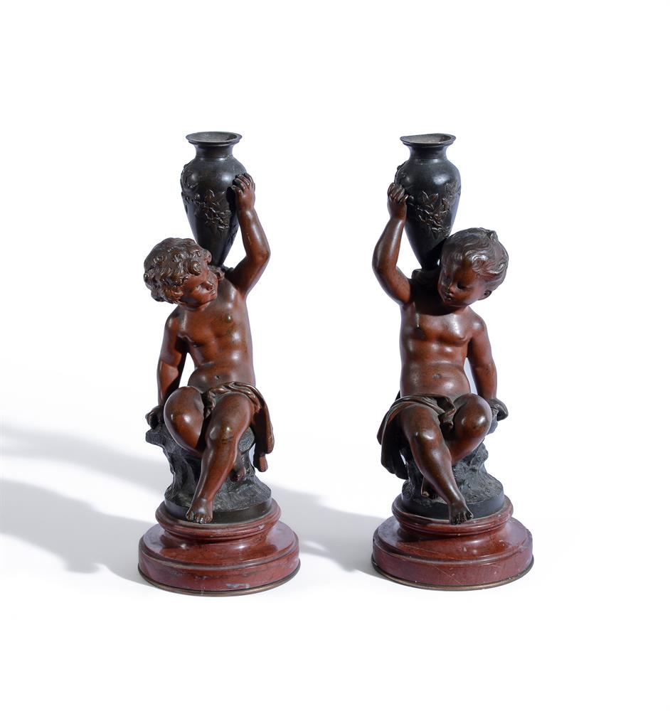 AFTER AUG. MOREAU, A PAIR OF PATINATED MODELS OF CHILDREN HOLDING AMPHORA