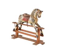 A PAINTED ROCKING HORSE