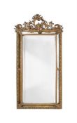 A GILT GESSO WALL MIRROR OR OVERMANTELIN BAROQUE STYLE