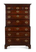 A GEORGE III MAHOGANY AND OAK CHEST ON CHEST