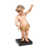 A POLYCHROME PAINTED FIGURE OF A PUTTI