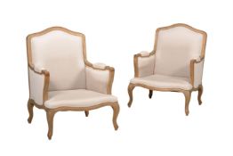 A PAIR OF BEECH AND LINEN UPHOLSTERED ARMCHAIRS IN FRENCH STYLE