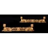 A PAIR OF GILTWOOD OVERDOOR MANTELS