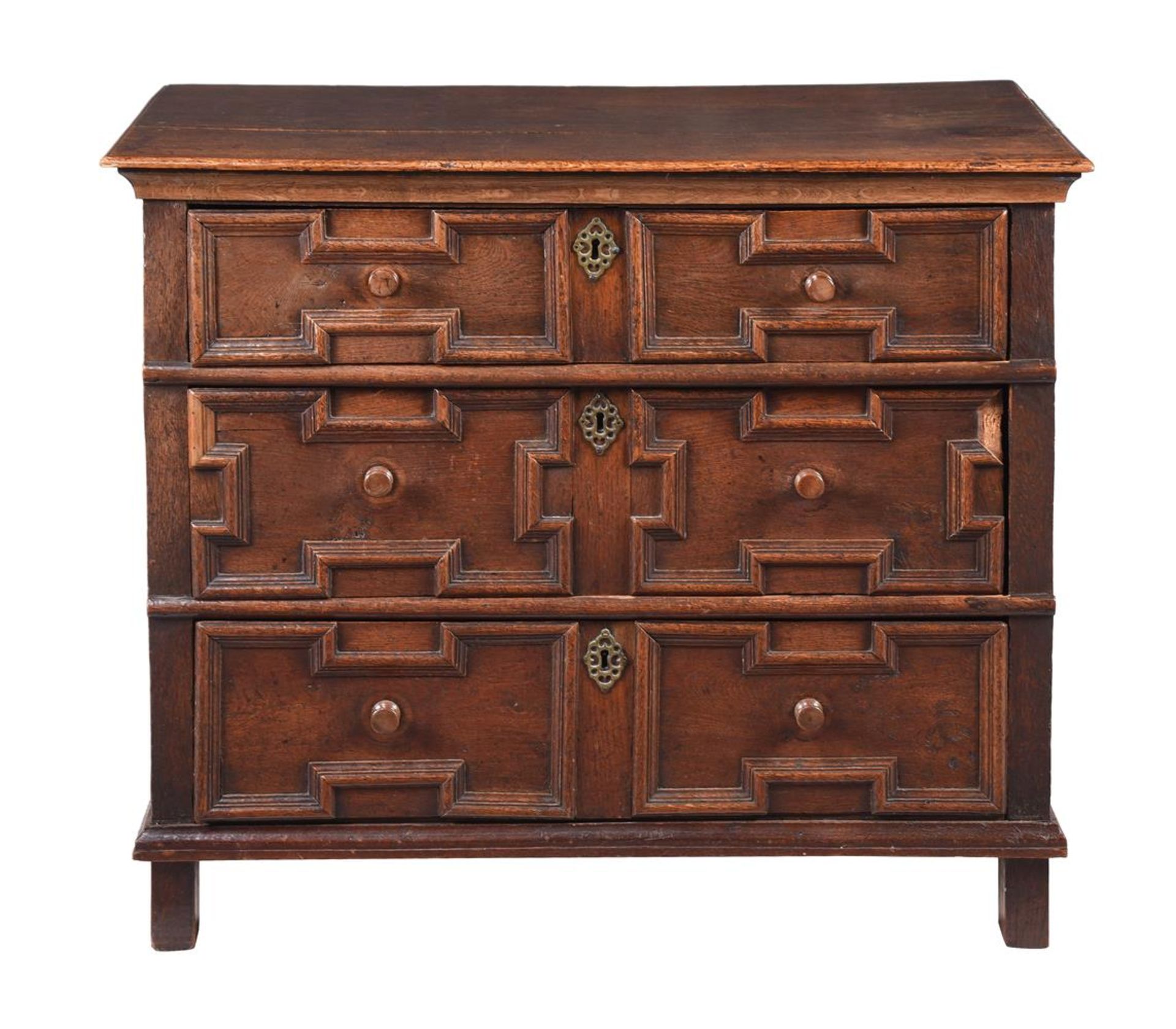 A CHARLES II OAK CHEST OF DRAWERS