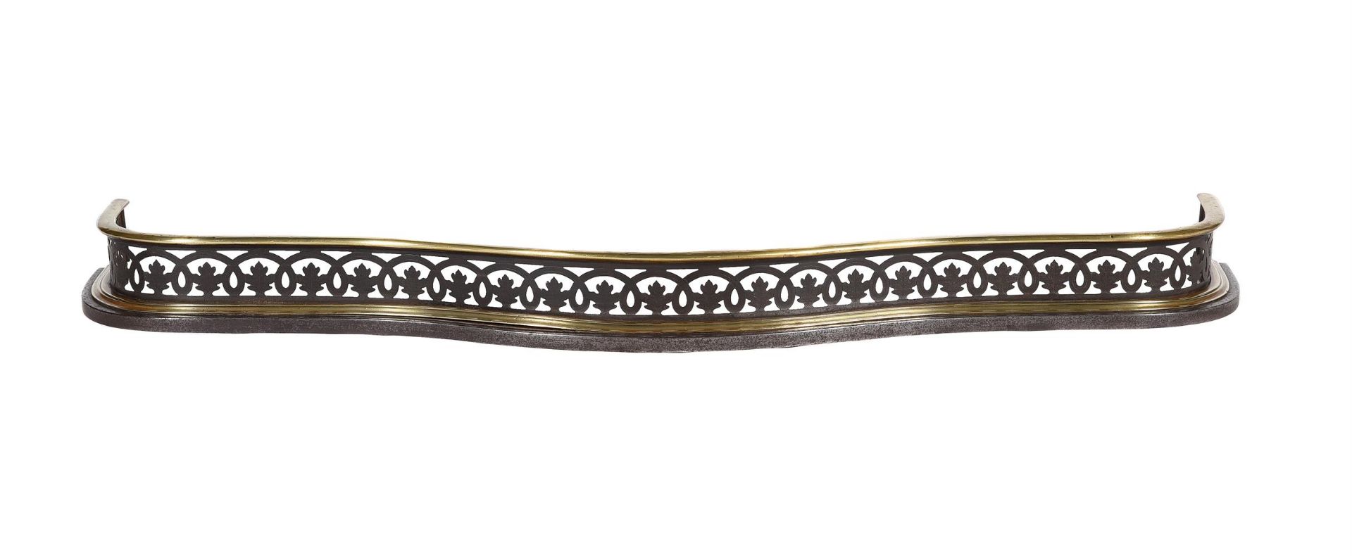 A REGENCY STEEL AND GILT BRASS FENDER