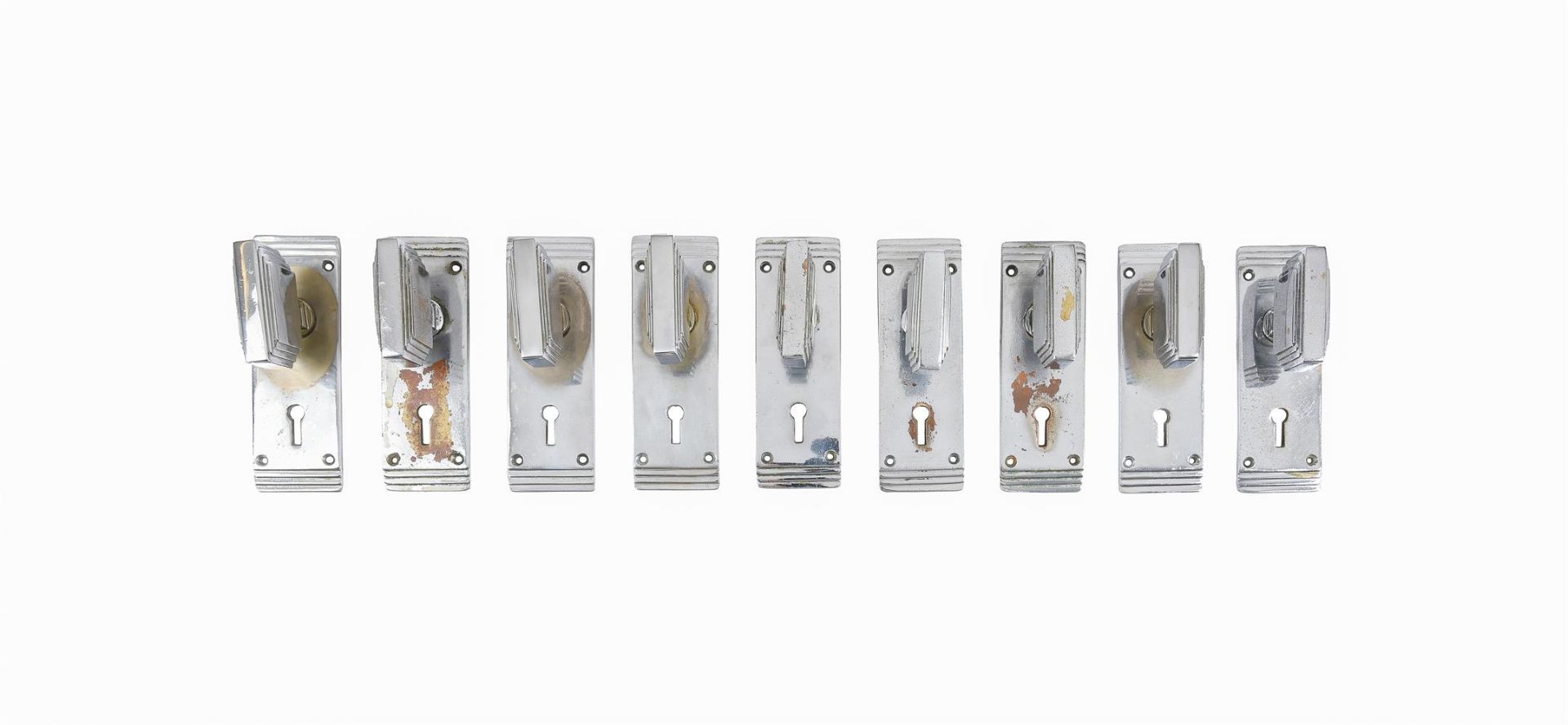 FOUR PAIRS OF ART DECO CHROME PLATED DOOR HANDLES