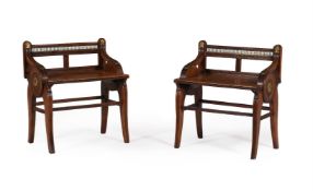 A MATCHED PAIR OF AESTHETIC MOVEMENT OAK AND BRASS MOUNTED HALL SEATS
