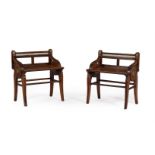 A MATCHED PAIR OF AESTHETIC MOVEMENT OAK AND BRASS MOUNTED HALL SEATS