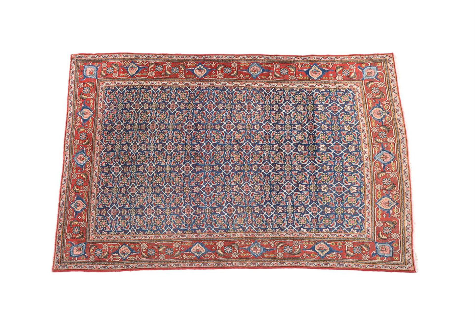 A PERSIAN QUM RUG