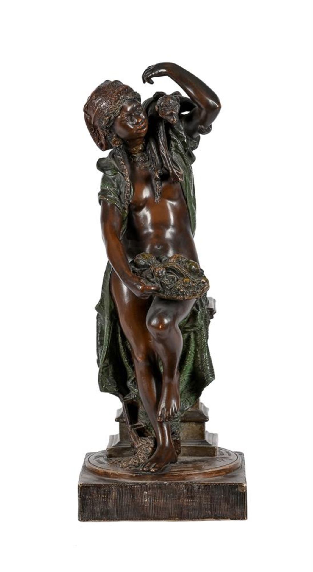 A GOLDSCHEIDER COLD PAINTED TERRACOTTA FIGURE OF A GIRL WITH MONKEY