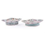 A PAIR OF CHINESE FAMILLE ROSE FOOTED DISHES