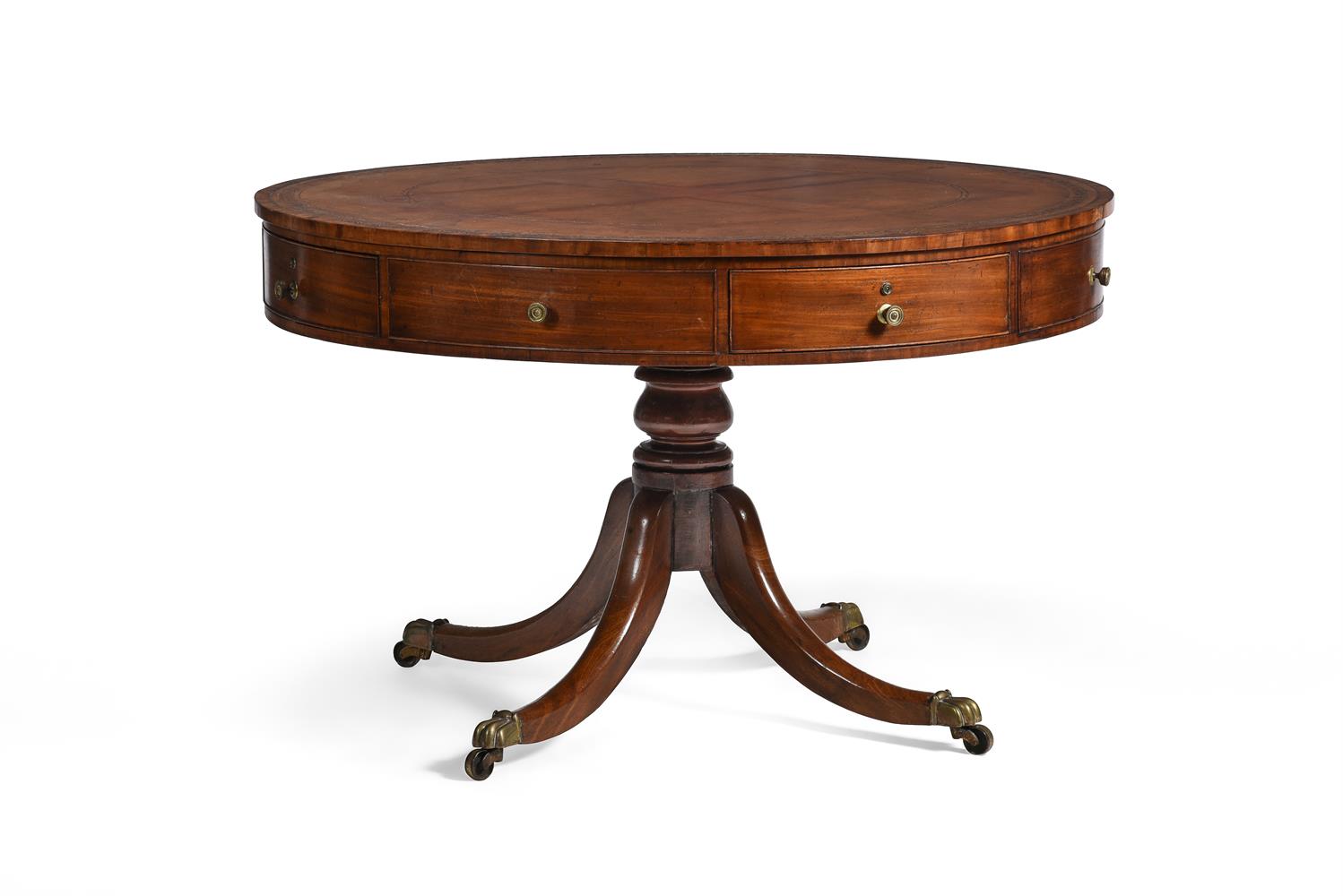 A GEORGE IV MAHOGANY DRUM LIBRARY TABLE