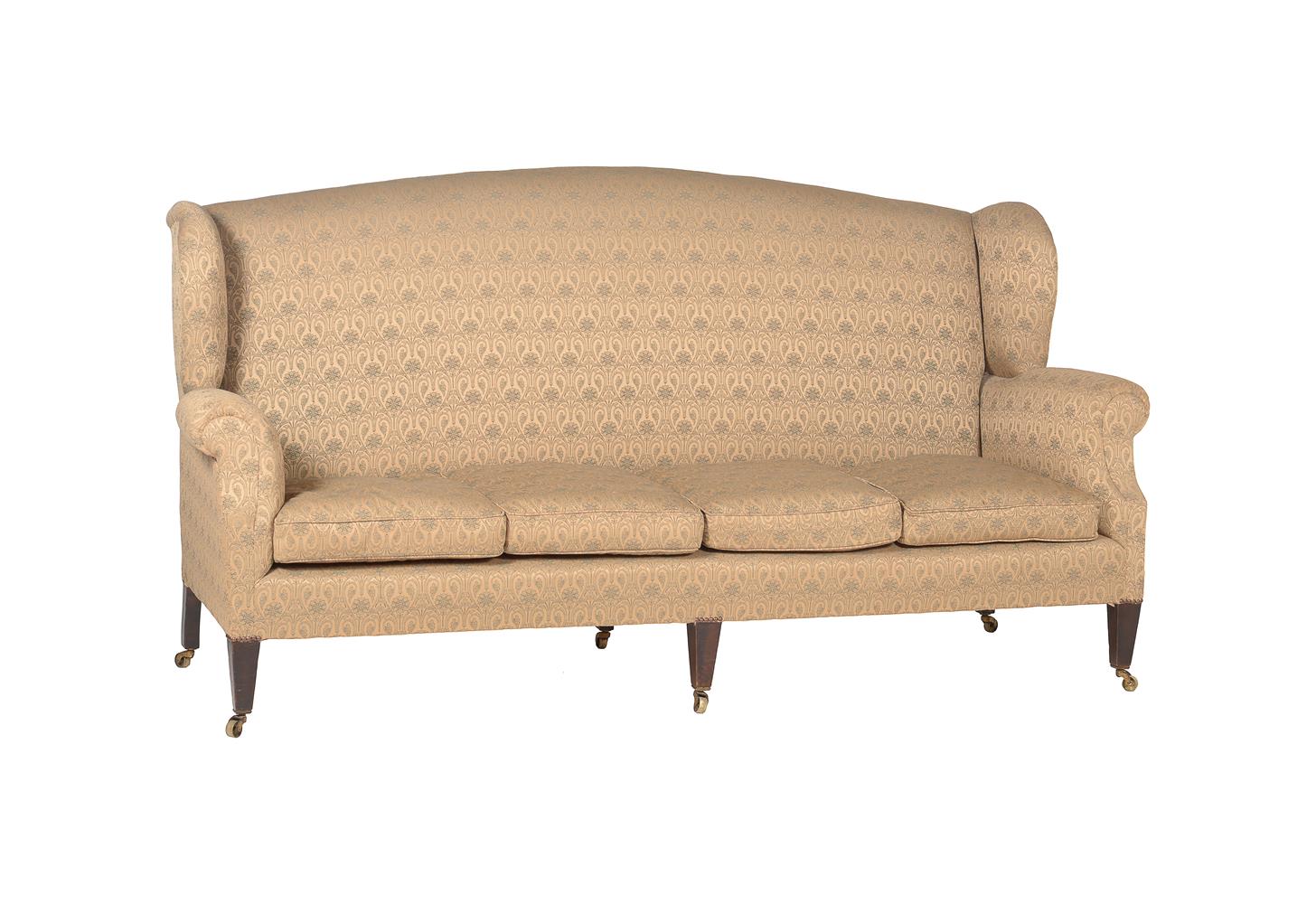 A MAHOGANY AND UPHOLSTERED SOFA IN GEORGE III STYLE