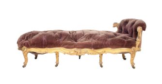 A VICTORIAN GILTWOOD AND VELVET UPHOLSTERED CHAISE LONGUE OR DAY BED
