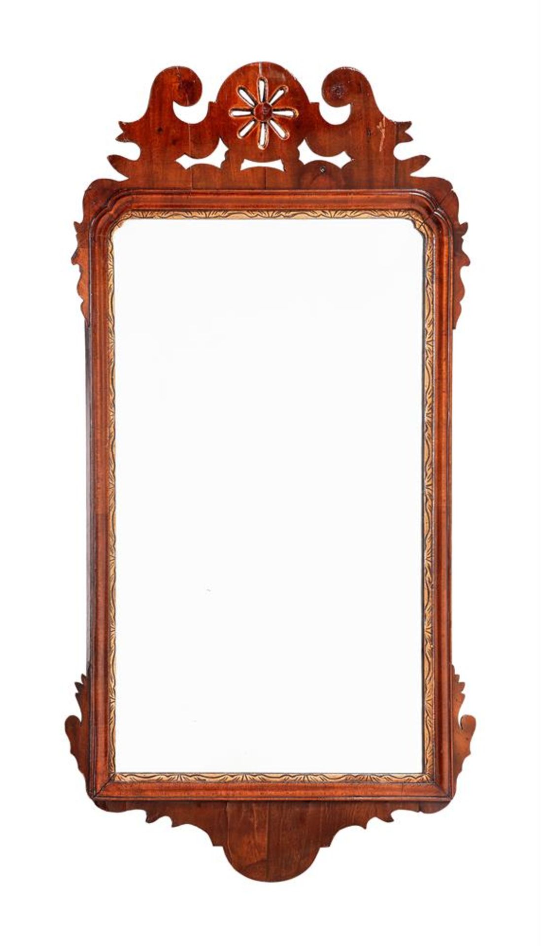 A GEORGE II WALNUT FRETWORK WALL MIRROR